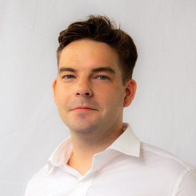 Adam Theisen Headshot 
